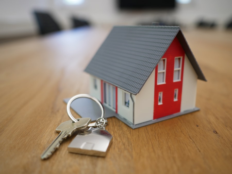 Model house and house keys on a table, the goal behind every mortgage payment estimate